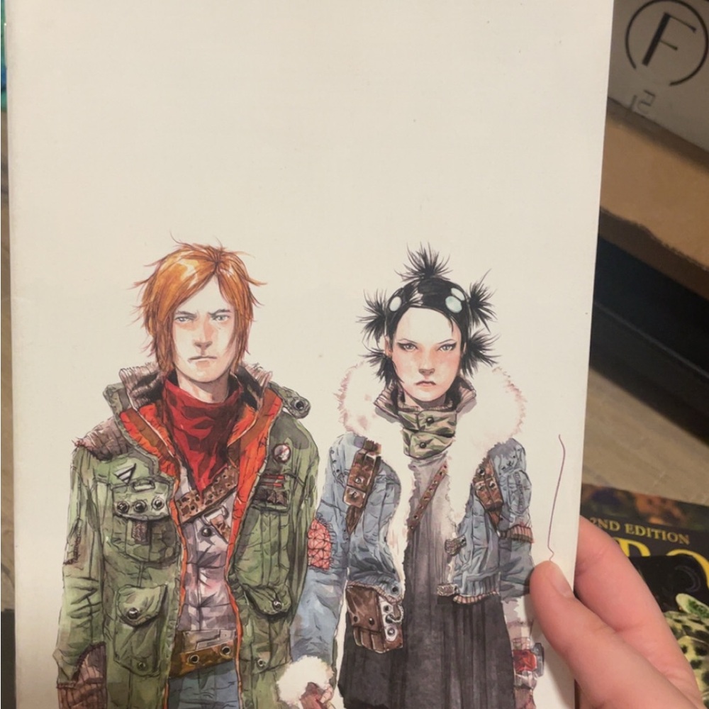 Descender- Two Characters Illustration in Green and Blue comic book